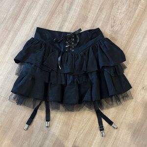 Chic Black Ruffled Mini Skirt with Lace-Up Front